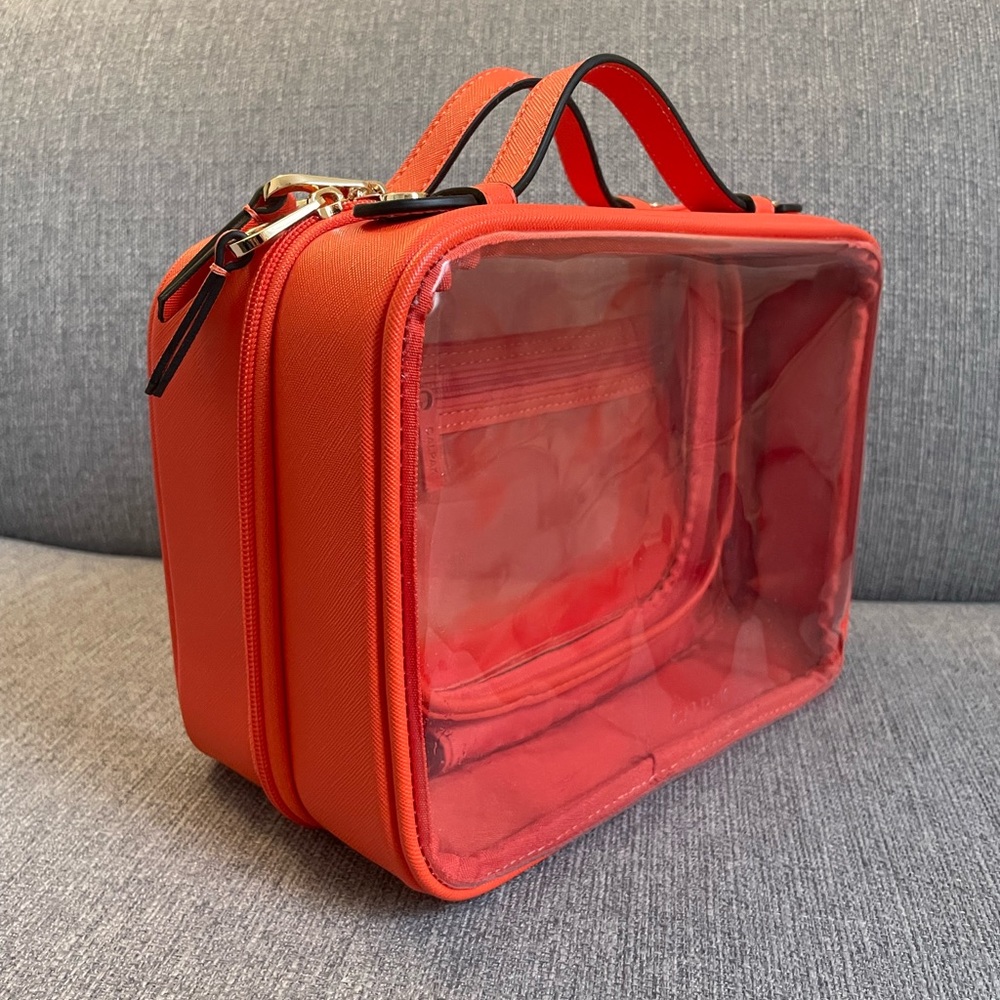 CALPAK medium clear cosmetics bag in papaya